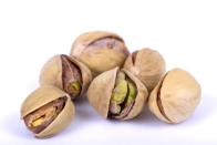 <p><strong>Just having to crack the shell open on pistachios can help you slow down and eat a bit more mindfully, </strong>which can lead to better portion control. <a href="https://americanpistachios.org/research-archives/weight-research" rel="nofollow noopener" target="_blank" data-ylk="slk:Research;elm:context_link;itc:0;sec:content-canvas" class="link ">Research</a> shows that individuals ate 41% more calories worth of nuts when eating the no shell variety vs the in shell option.</p>