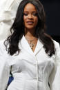 Rihanna poses as she unveils her first fashion designs for Fenty at a pop-up store in Paris, France, Wednesday, May 22, 2019. Singer Rihanna is the first black woman in history to head up a major Parisian luxury house, and the collection, named after the singer turned designer's last name, comprises of ready-to-wear, footwear, accessories, and eyewear and is available for sale Paris' Le Marais area from Friday and will debut online May 29. (AP Photo/Francois Mori)