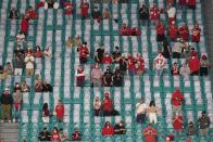 Fans watch before an NCAA College Football Playoff national championship game between Alabama and Ohio State, Monday, Jan. 11, 2021, in Miami Gardens, Fla. (AP Photo/Wilfredo Lee)