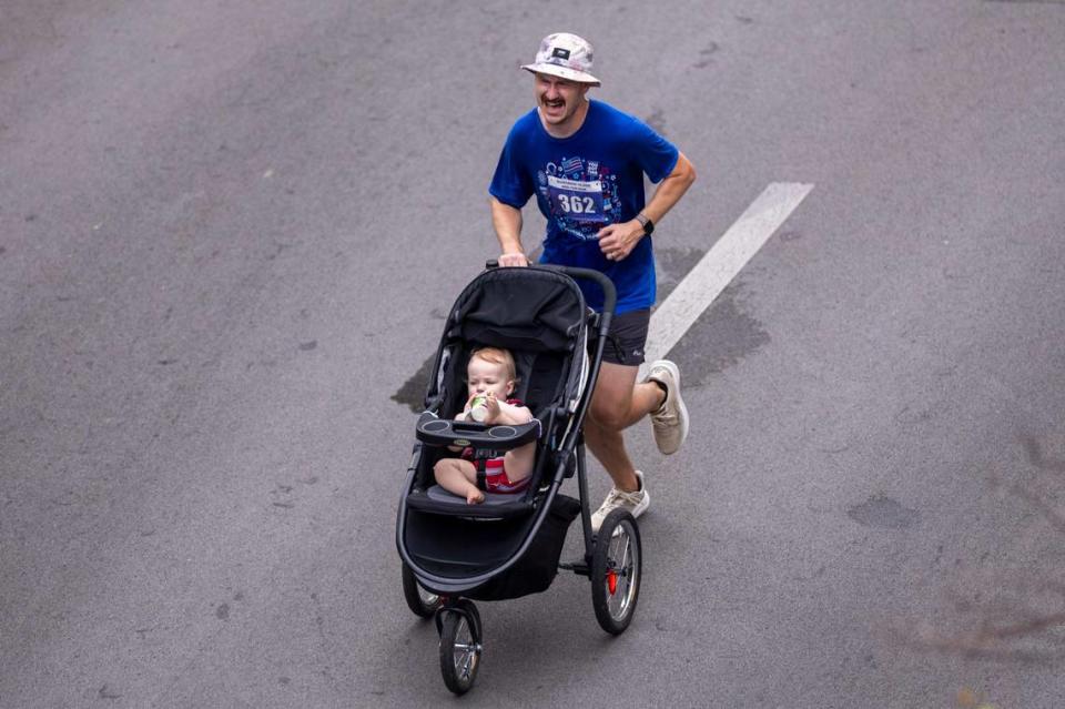 During Thursday morning’s humid weather, a baby seemed undaunted. For the runners, more effort was required.