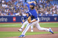 Toronto Blue Jays starting pitcher Kevin Gausman throws to a St. Louis Cardinals batter during the first inning of a baseball game Wednesday, July 27, 2022, in Toronto. (Jon Blacker/The Canadian Press via AP)