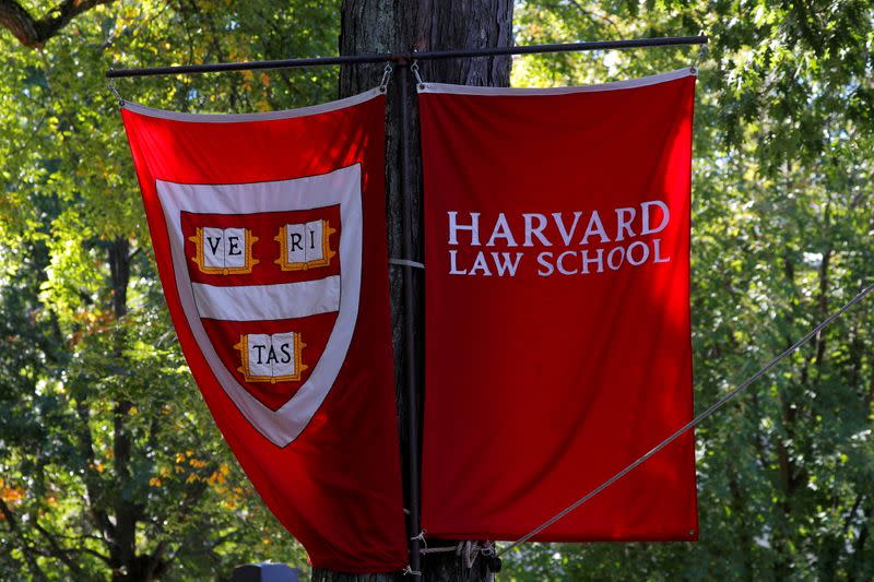 FILE PHOTO: FILE PHOTO: Banners for Harvard Law School fly during the inauguration of Lawrence Bacow as the 29th President of Harvard University in Cambridge