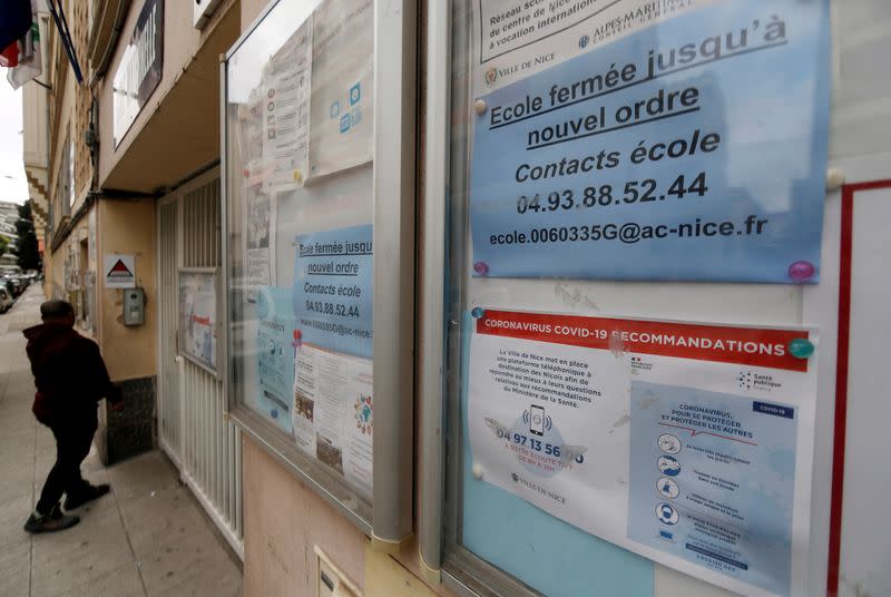 FILE PHOTO: An information sign about the closure of a school due to the coronavirus disease (COVID-19) is seen in Nice