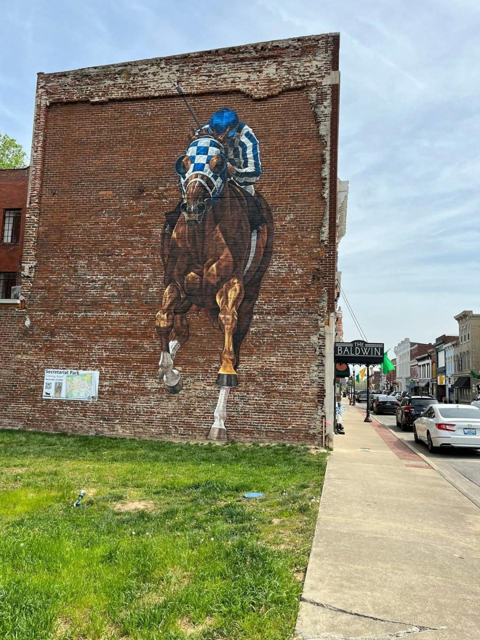Equine artist Jaime Corum has painted this larger-than-life mural depicting Secretariat’s victory in the 1973 Kentucky Derby. It’s located at 525 Main Street in Paris.