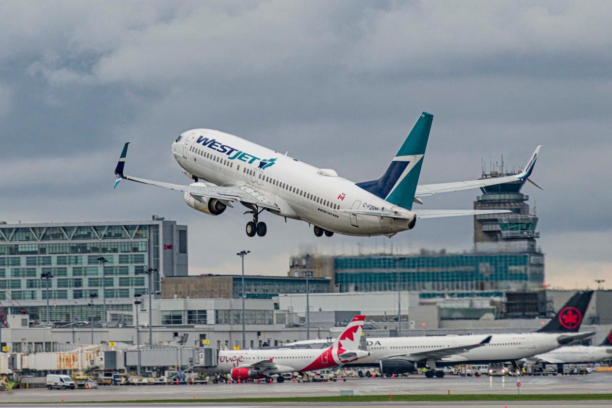 WestJet president Diederik Pen says work stoppages could begin as early as Tuesday at noon MT. (Daniel Thomas/CBC - image credit)