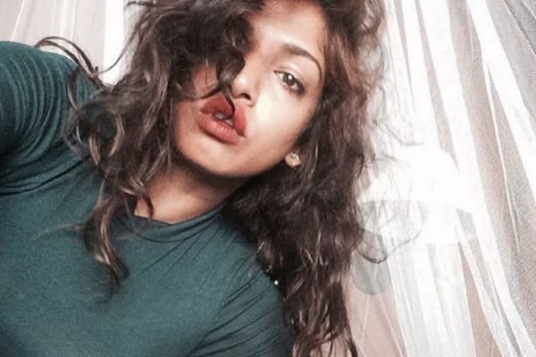 She got the name M.I.A. while making a film about her missing cousin.