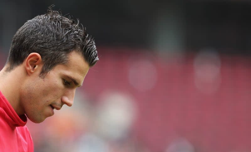 Arsenal's Robin van Persie in action before the test soccer match between 1. FC Cologne and Arsenal FC at Rhein-Energie Stadium. Former striker Van Persie takes first professional coaching job picture alliance / dpa