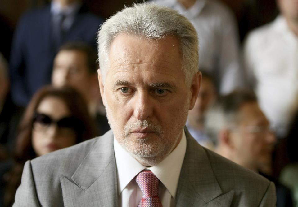 Ukrainian oligarch Dymitro Firtash waits for the start of his trial at the Austrian supreme court in Vienna, Austria, Tuesday, June 25, 2019. Austrian supreme court rules on extradition case of Ukrainian oligarch Dymitro Firtash to the US. (AP Photo/Ronald Zak)