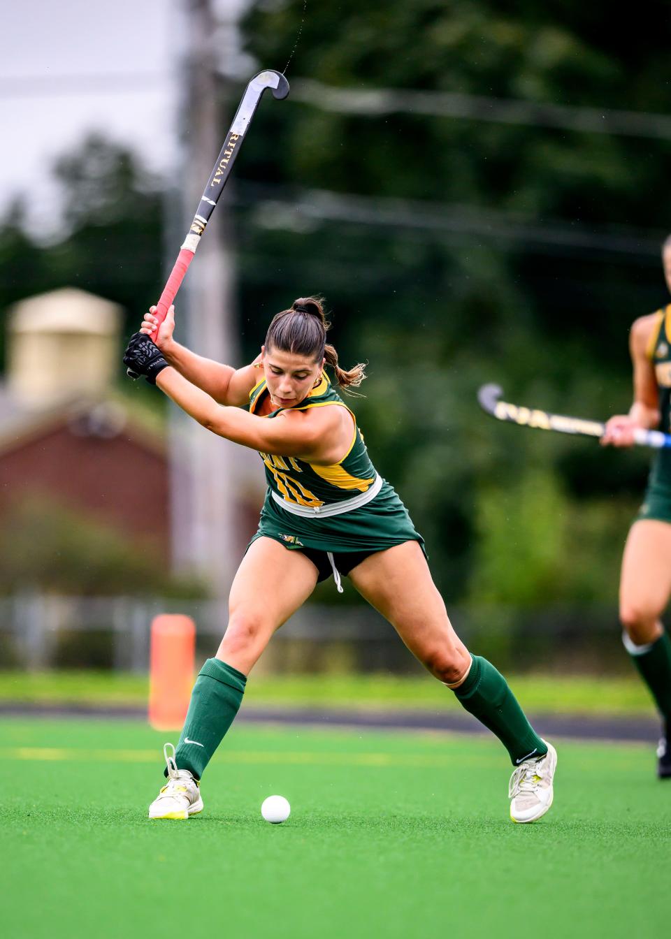 Former Oakmont Regional field hockey star Maddie Moran winds up for a shot during a recent game for the University of Vermont.