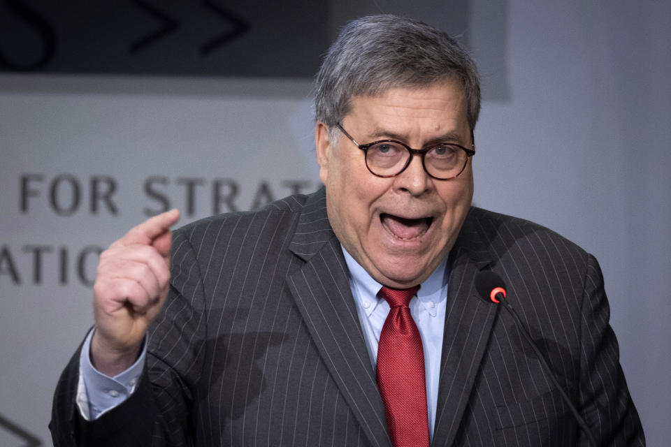 Attorney General William Barr gives the keynote address to the Center for Strategic and International Studies, CSIS China Initiative Conference, Thursday, Feb. 6, 2020, in Washington. (AP Photo/Cliff Owen)