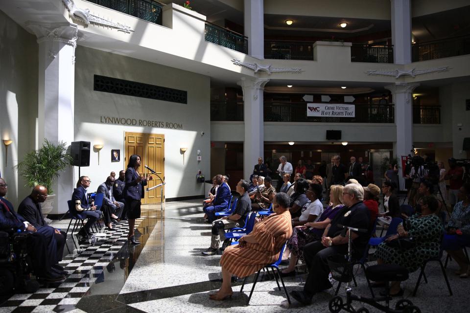 Mayor’s Victim Assistance Advisory Council chairwoman Nicoa Garett (standing at podium left) helps kick off Jacksonville's observance of National Crime Victims’ Rights Week at City Hall.