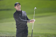 Rory McIlroy, of Northern Ireland, watches his shot from a bunker along the first fairway during the third round of the Arnold Palmer Invitational golf tournament, Saturday, March 7, 2020, in Orlando, Fla. (AP Photo/Phelan M. Ebenhack)