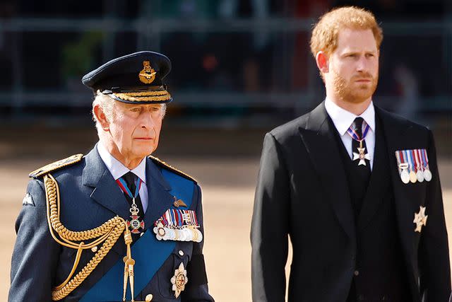 <p>Jeff J Mitchell - WPA Pool/Getty</p> King Charles and Prince Harry join a procession for Queen Elizabeth's Lying-in-State on Sept. 14, 2022