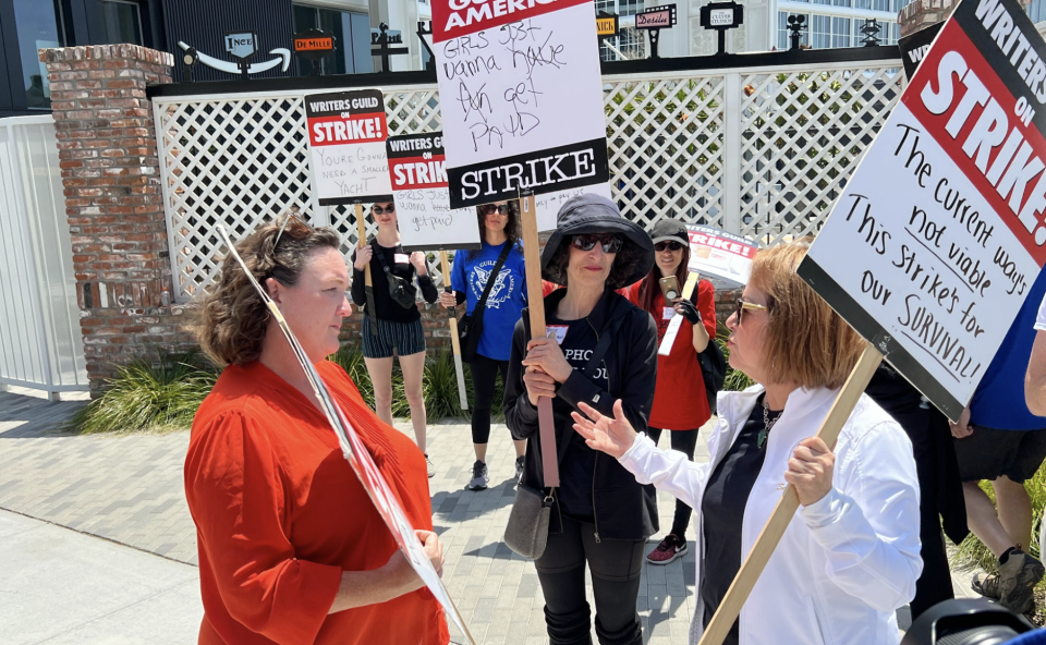 Rep. Katie Porter speaking with California Senator María Elena Durazo on the picket line at the Culver Studios