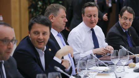 British Prime Minister David Cameron (2nd R) attends a meeting with European Union leaders during a EU summit addressing the talks about the so-called Brexit and the migrants crisis, in Brussels, Belgium, February 19, 2016. REUTERS/Olivier Hoslet/Pool