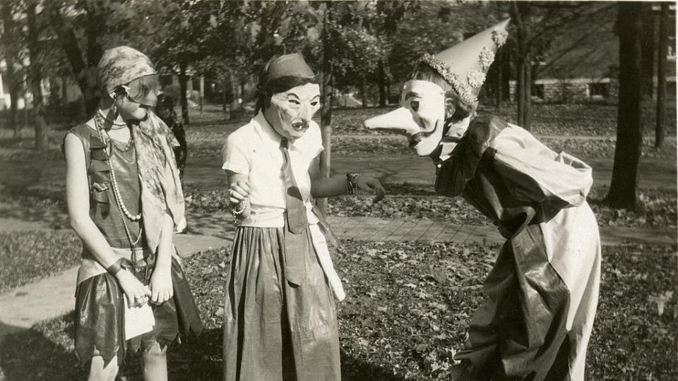 <p>Three girls wearing masked costumes in Cincinnati, Ohio in1929. </p>