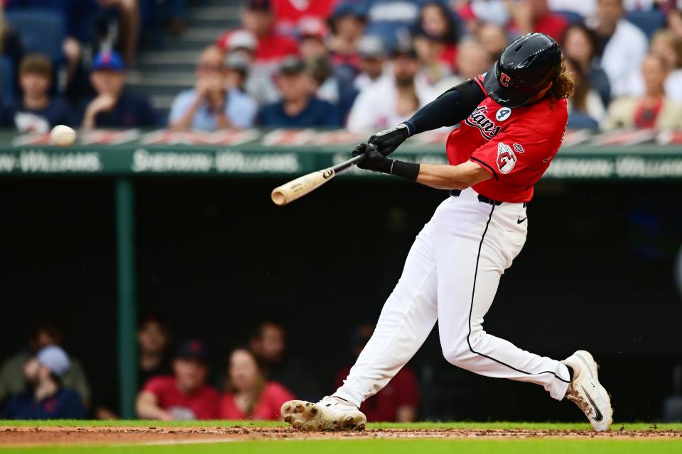 Cleveland Guardians' Daniel Schneemann (10) hits an RBI double during the second inning Sunday against the Washington Nationals at Progressive Field.