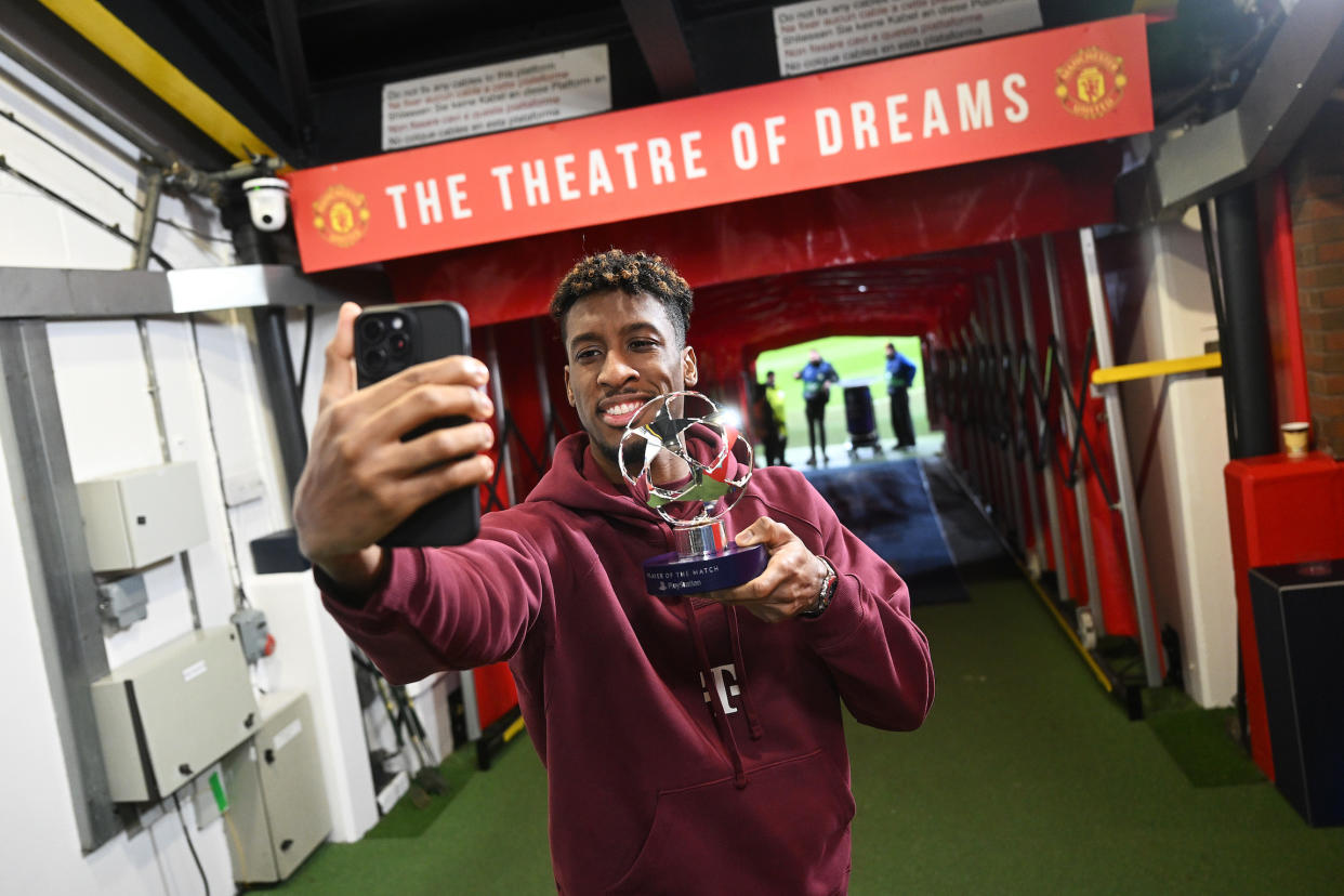 Bayern Munich's Kingsley Coman poses with the Player of the Match trophy. (Michael Regan/UEFA via Getty Images)