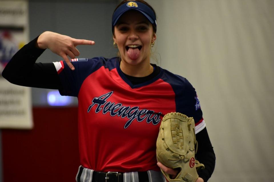 Maia Carlson, a senior outfielder at Byron High School, smiles for the camera while playing during The Cup indoor softball tournament in Schiedam, Netherlands, on Saturday, Jan. 14, 2023.