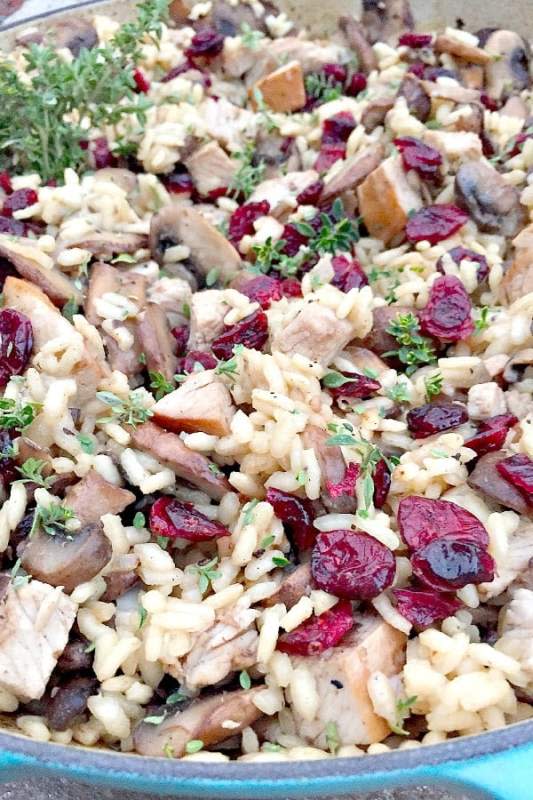 <p>The Reluctant Entertainer</p><p>This turkey mushroom cranberry risotto is creamy, delicious and perfect for leftover turkey.</p><p><strong>Get the recipe: <a href="http://reluctantentertainer.com/2014/11/turkey-mushroom-cranberry-risotto/" rel="nofollow noopener" target="_blank" data-ylk="slk:Turkey Mushroom Cranberry Risotto;elm:context_link;itc:0;sec:content-canvas" class="link rapid-noclick-resp">Turkey Mushroom Cranberry Risotto</a></strong></p>