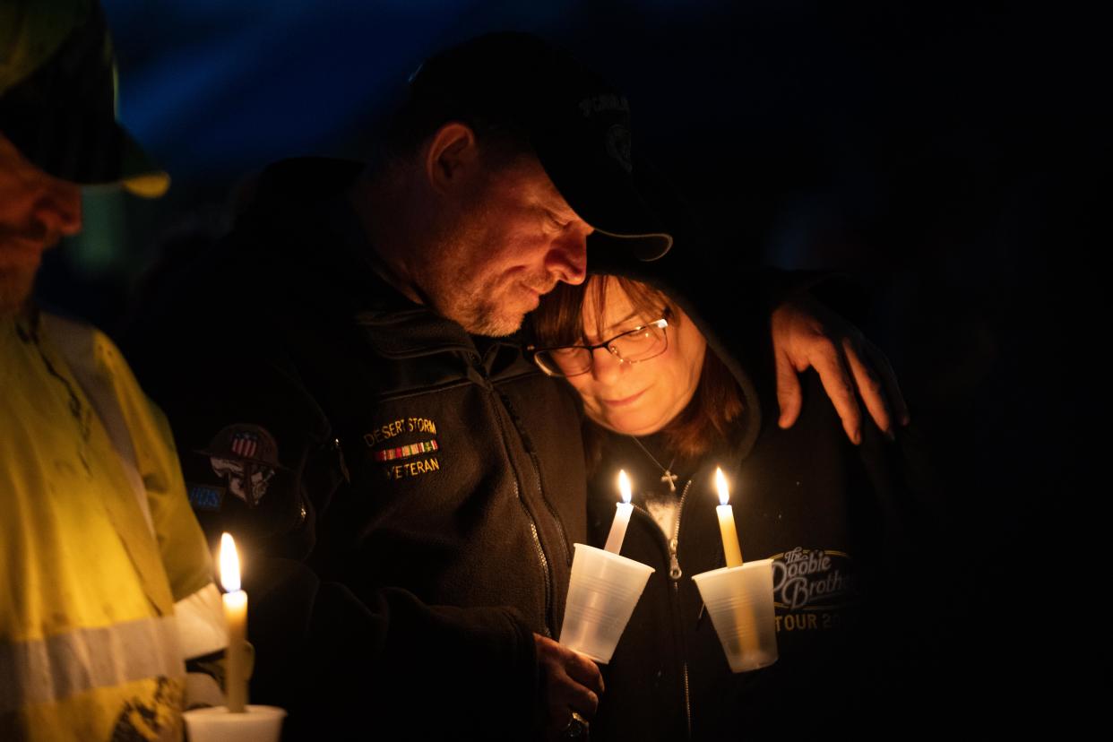 Community members gather as they honor the victims of a shooting at Perry High School Thursday, Jan. 4, 2024, at Wiese Park in Perry.