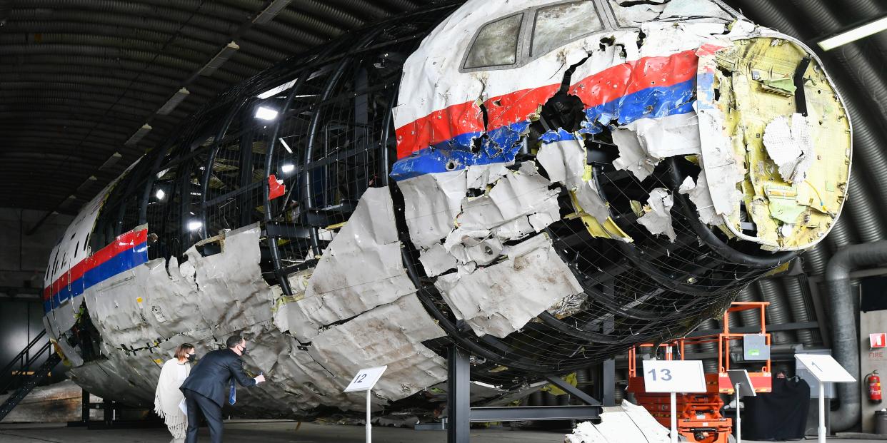 Lawyers attend the judges' inspection of the reconstruction of the MH17 wreckage, as part of the murder trial ahead of the beginning of a critical stage, on May 26, 2021 in Reijen, Netherlands.