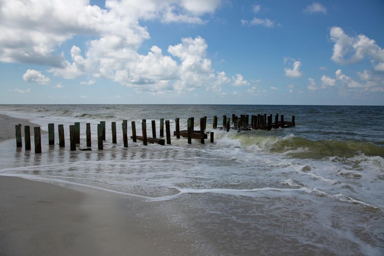 A storm beach outfall is pictured along the shore of Naples beach, Friday, Sept. 18, 2020.