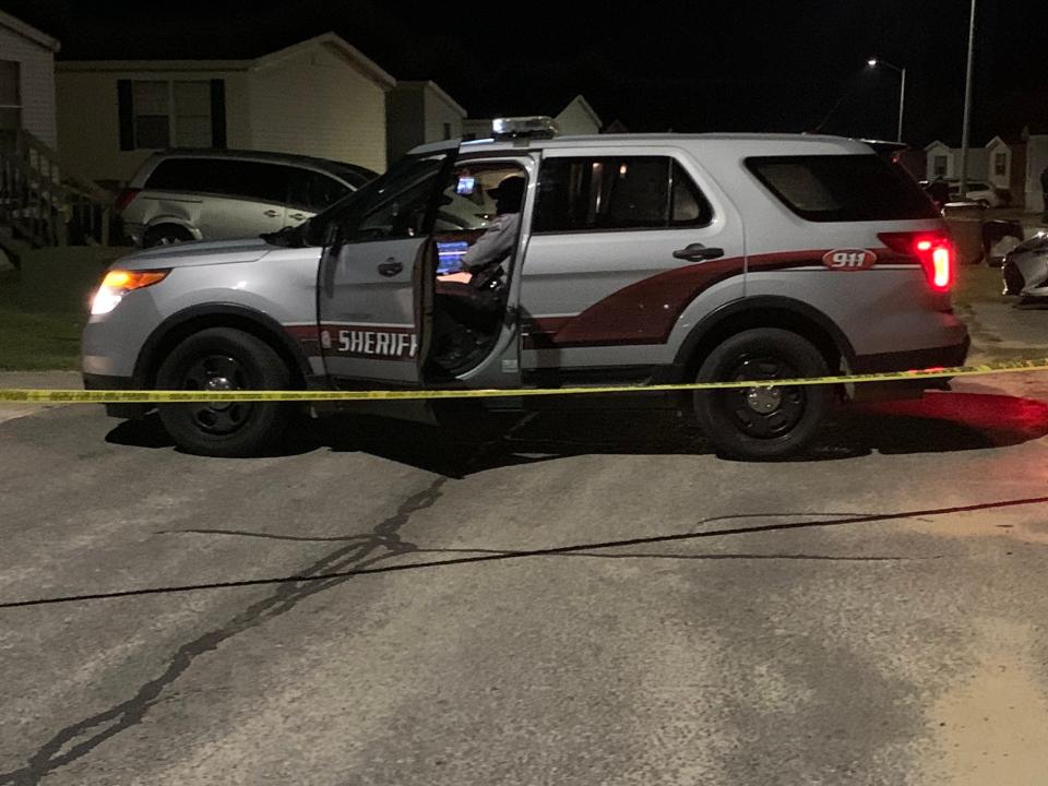 A Cumberland County Sheriff's Office vehicle is behind crime scene tape May 15 on Spearfish Lane while law enforcement investigates the shooting death of Daniel Sulton.