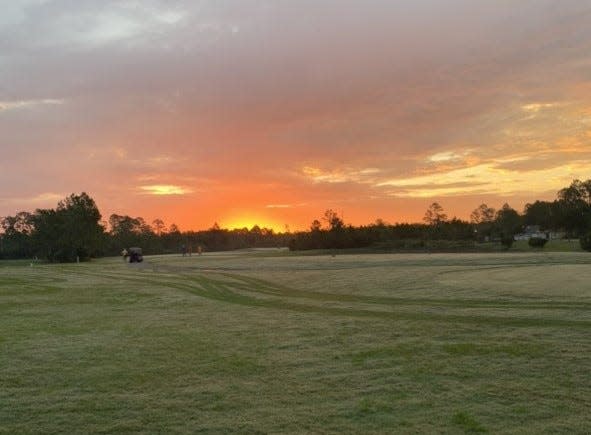 The sun comes up over the first hole at the Grand Reserve Golf Club in Bunnell.