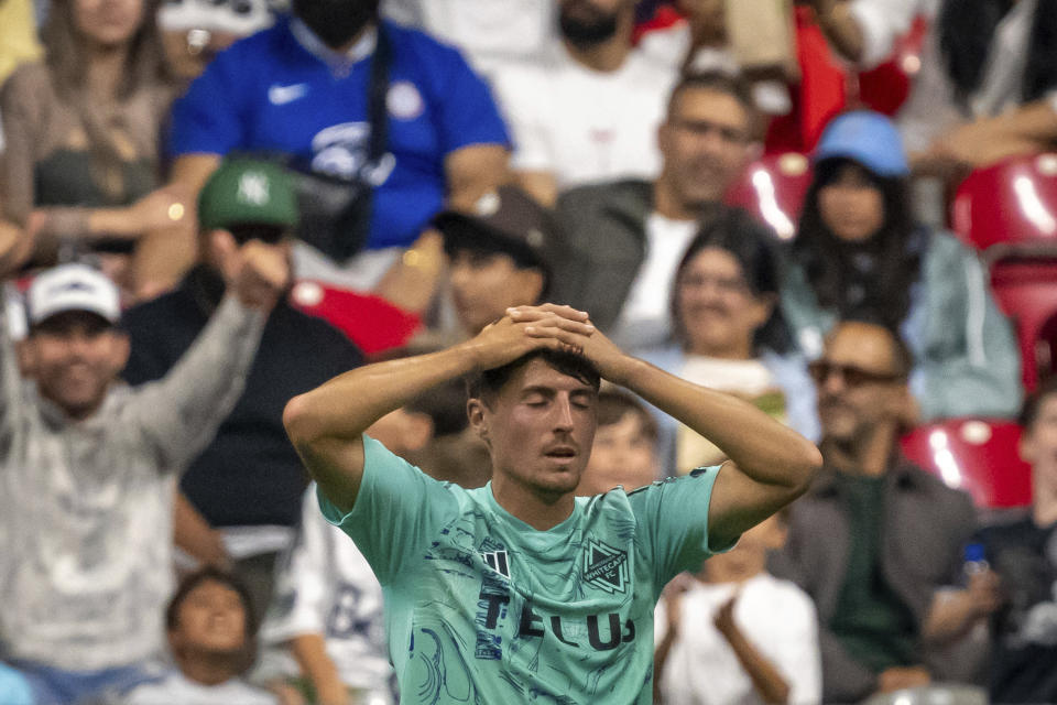 Vancouver Whitecaps' Alessandro Schöpf reacts after missing a shot on goal against the San Jose Earthquakes during first-half MLS soccer match action in Vancouver, British Columbia, Sunday, Aug. 20, 2023. (Ethan Cairns/The Canadian Press via AP)