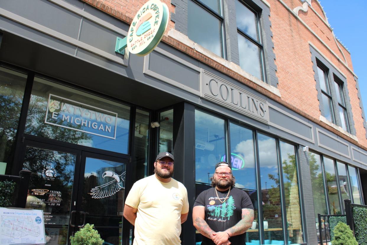 Tristan and Jackson Bredehoft stand for a photograph outside Cafe Rica.