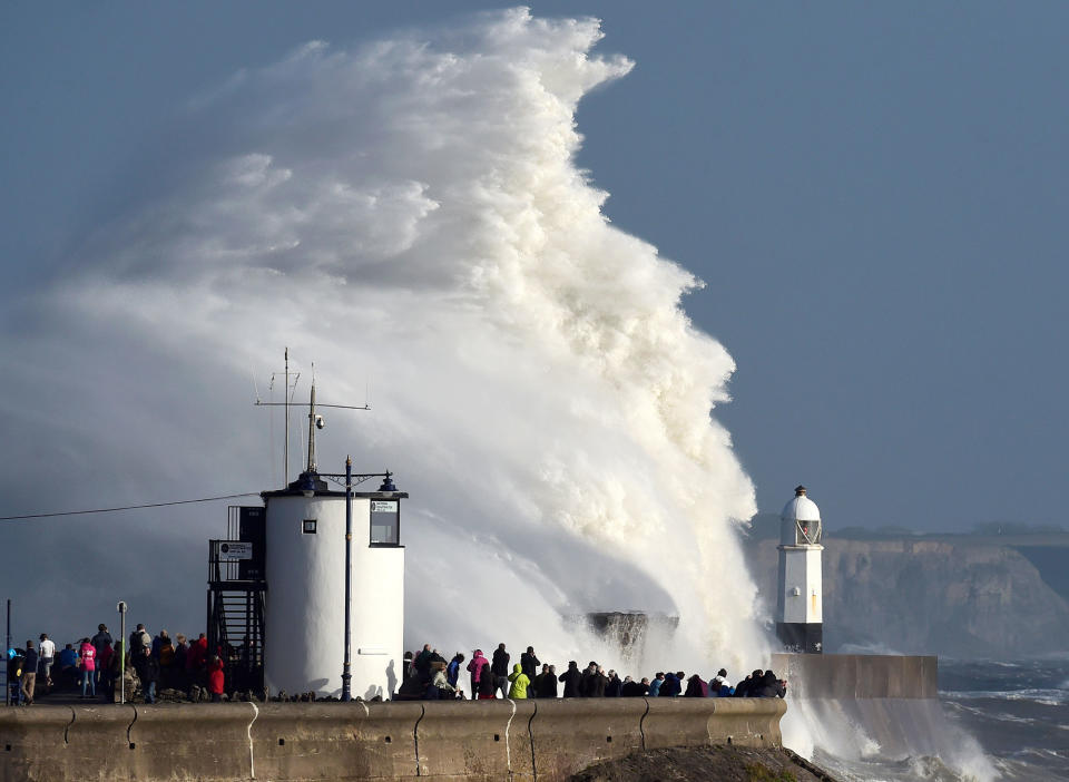 <p>Waves crash over the lighthouse as storm Ophelia passes Porthcawl, Wales, Britain, Oct.16, 2017. (Photo: Rebecca Naden/REuters) </p>