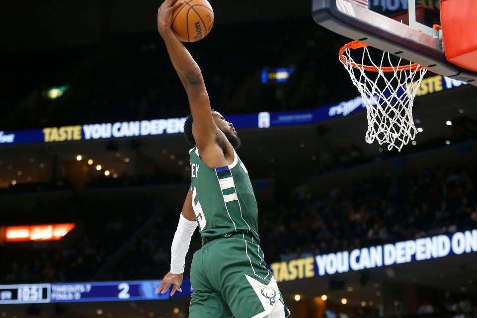 Bucks guard Malik Beasley elevates for a dunk during the first half against the Grizzlies on Tuesday night.