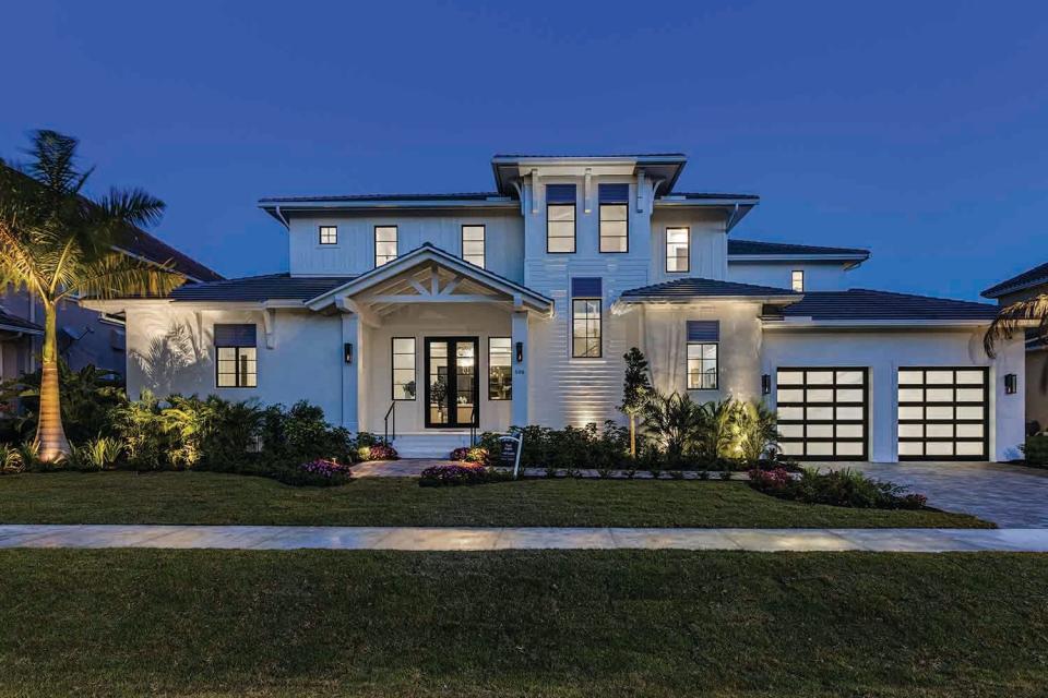 An exterior view of The Lykos Group’s latest Marco Island spec home at 506 Tigertail Court, Marco Island.