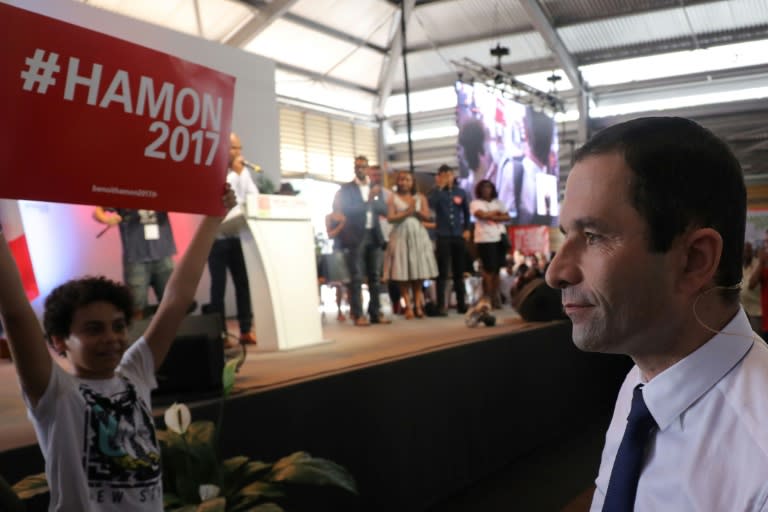 French presidential candidate for the Socialists Benoit Hamon (R) is promoting his univeral basic income