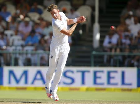 England's Stuart Broad attempts to field from his own bowling during the second cricket test match against South Africa in Cape Town, South Africa, January 3, 2016. REUTERS/Mike Hutchings