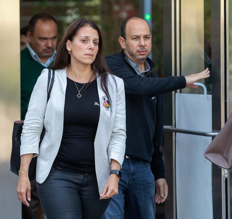VAN NUYS, CA-APRIL 25, 2022: Nancy Iskander and her husband Karim exit Van Nuys Courthouse during a lunch break from a preliminary hearing for Rebecca Grossman who is charged with murder and other counts stemming from a crash in Westlake Village that left the Iskanders sons Mark Iskander, 11, and Jacob Iskander, 8, dead. Nancy Iskander took the witness stand and testified to the moment her sons were killed by Grossmans Mercedes as they were walking in the crosswalk on Triunfo Canyon Rd. In. Westlake. Village. (Mel Melcon / Los Angeles Times via Getty Images)