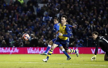 Brighton and Hove Albion's Sam Baldock scores a goal against Arsenal during their FA Cup fourth round soccer match at the Amex stadium in Brighton, southern England January 25, 2015. REUTERS/Stefan Wermuth