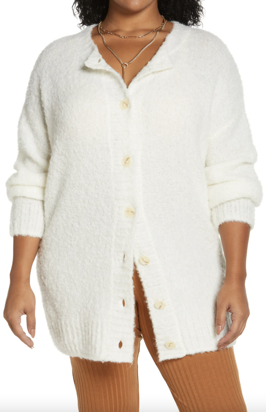 plus size model in white fuzzy Treasure & Bond Bouclé Cardigan (Photo via Nordstrom)