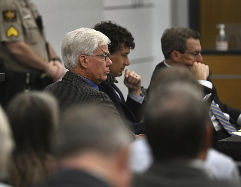 FILE - Thomas Martens, left, sits with attorneys Jones Byrd, center, and Jay Vannoy, right, during a hearing, Oct. 30, 2023, for Martens and his daughter, Molly Corbett, in the 2015 death of Molly's husband, Jason Corbett, at the Davidson County Courthouse in Lexington, N.C. Martens and Molly Corbett were released from separate North Carolina prisons on Thursday, June 6, 2024, after completing the tail end of their sentences for pleas to voluntary manslaughter. (Walt Unks/The Winston-Salem Journal via AP, Pool, File)