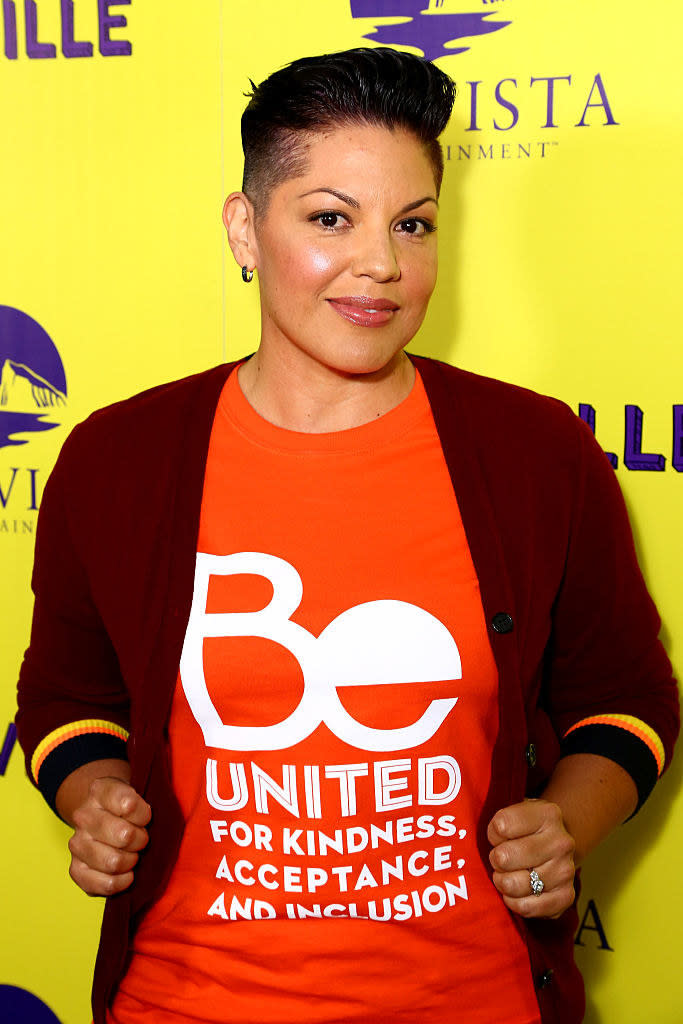 A closeup of Sara Ramirez smiling