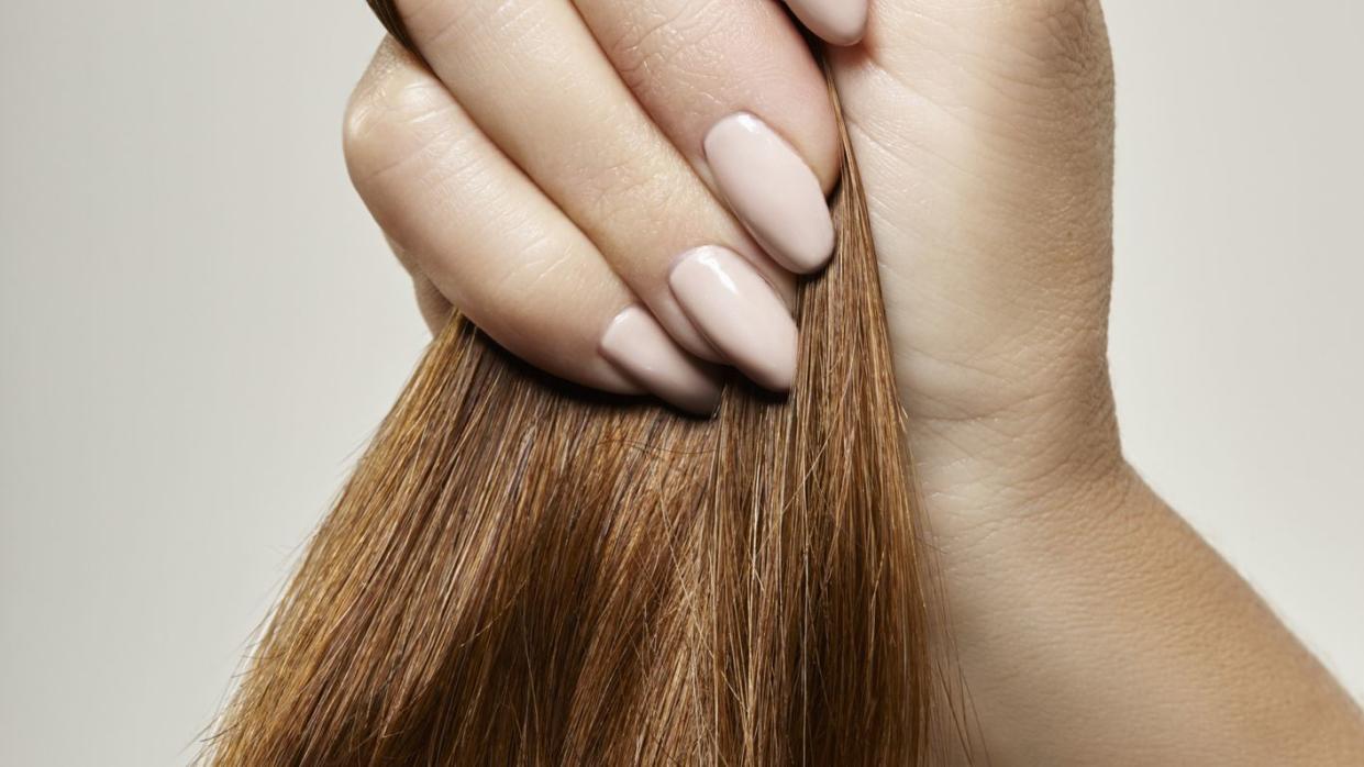 how to repair damaged hair, according to experts