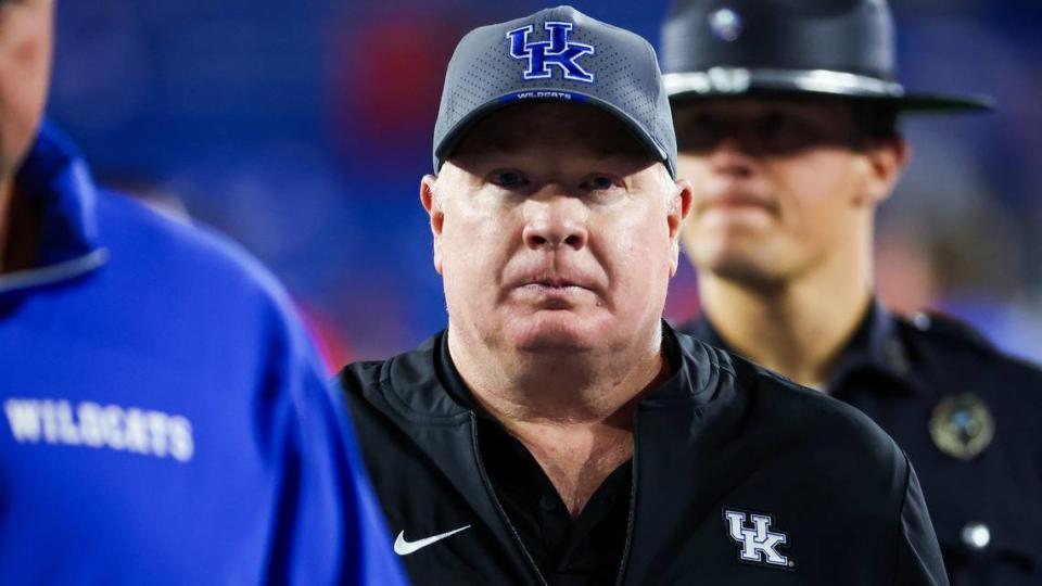 Kentucky head coach Mark Stoops leaves the field following his team’s 13-12 loss to Georgia on Saturday.