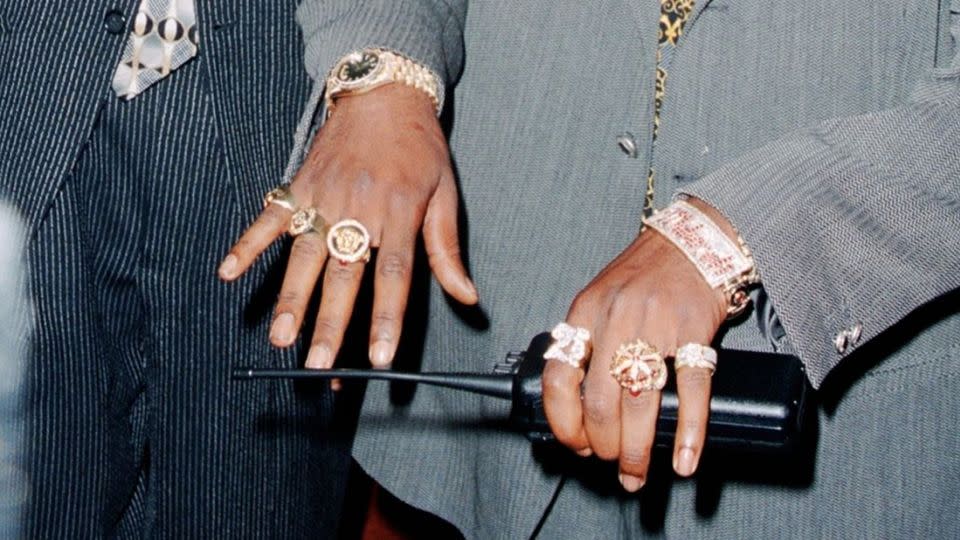 From left: Snoop Doggy Dogg and Tupac Shakur show off their rings - DMI/The LIFE Picture Collection//Shutterstock