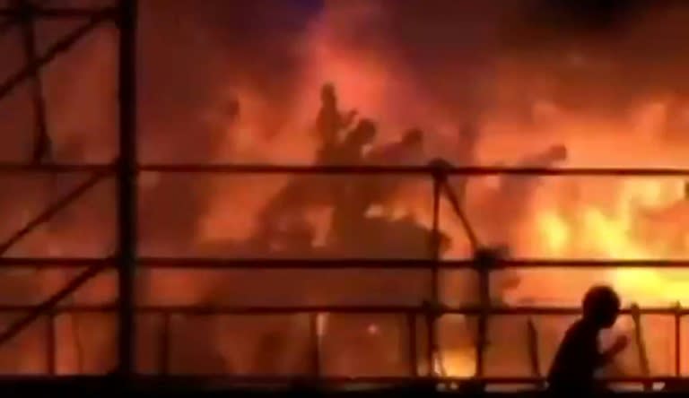 A frame grab from video footage shows revellers being engulfed by flames at the Formosa Fun Coast water park in New Taipei City, on June 27, 2015