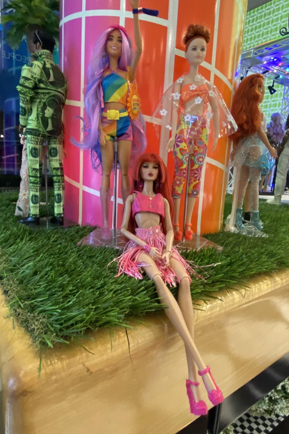 These festival-ready Barbies and plenty more are on display through the end of festival season at The Body Deli in Palm Desert for "The Barbie Music Festival Exhibition."