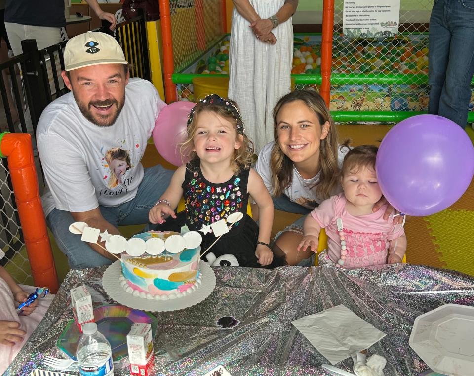 Michelle Clifford, her husband and children at a birthday party.