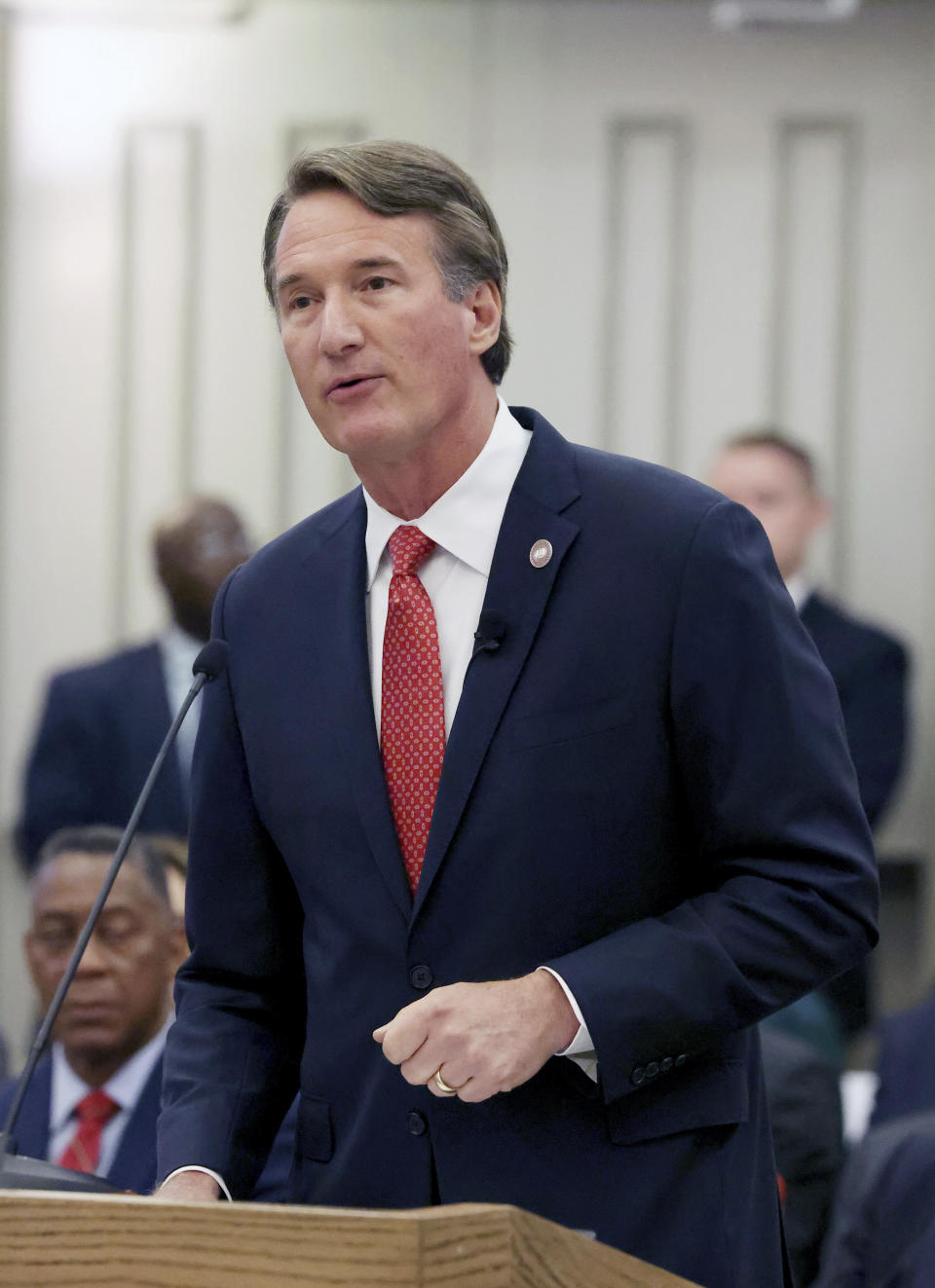 Virginia Gov. Glenn Youngkin speaks at a joint meeting of the legislature's money committees to talk about the state's revenues at the Pocahontas Building in Richmond, Va., on Wednesday, Aug. 23, 2023. (Daniel Sangjib Min/Richmond Times-Dispatch via AP)