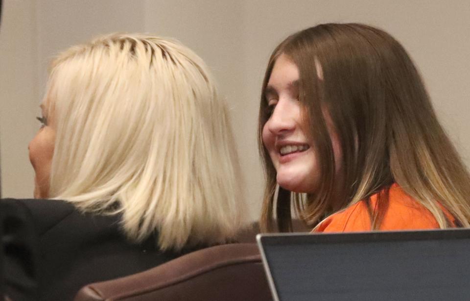 Nicole Jackson-Maldonado smiles as she talks with attorney Jessica Roberts, Wednesday July 6, 2022.