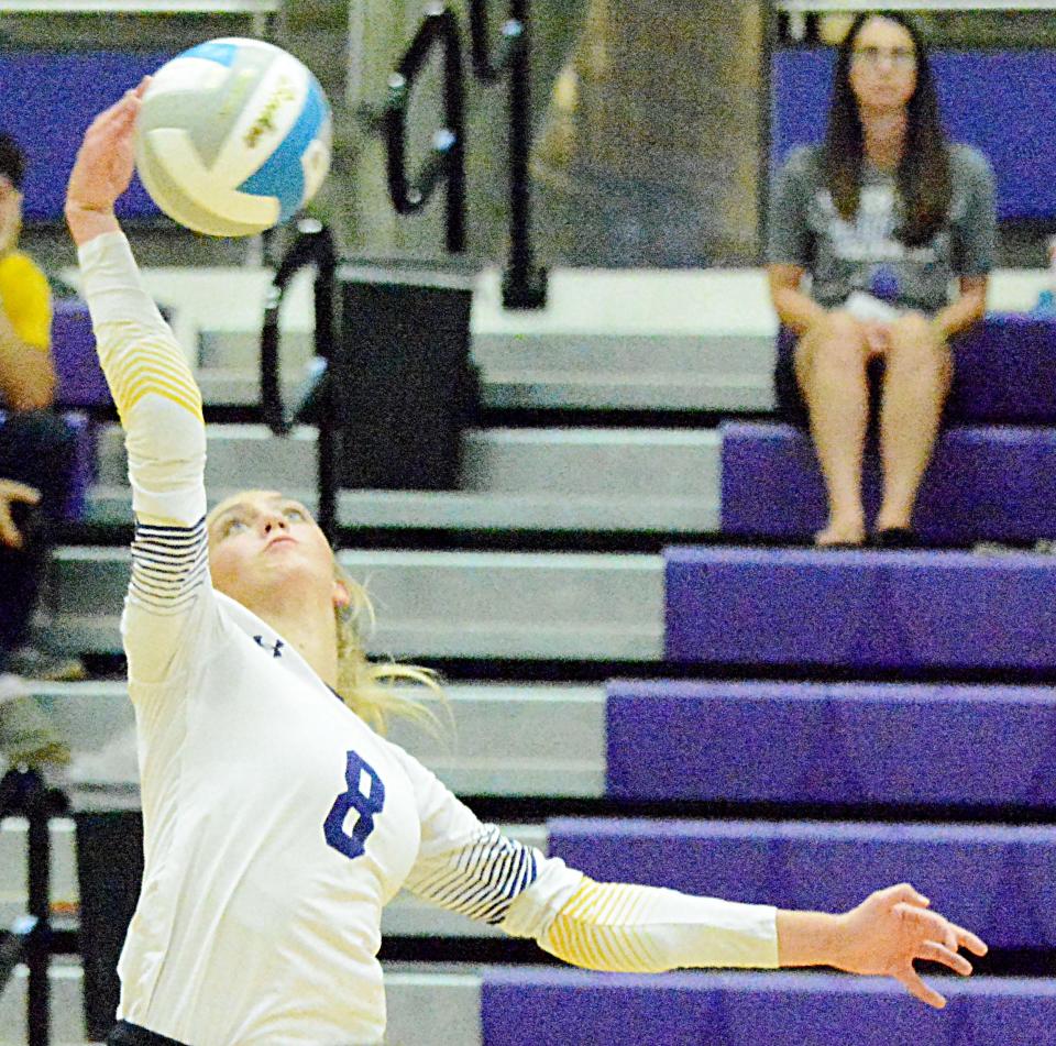 Watertown's Emily Tisher spikes the ball during an Eastern South Dakota Conference volleyball match against Brandon Valley Thursday night in the Civic Arena. The Arrows won 3-2.